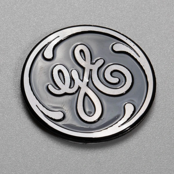 Markera logotypen i aluminium
