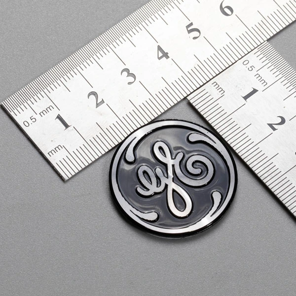 Markera logotypen i aluminium