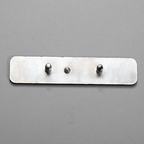 Logotypplatta i metall