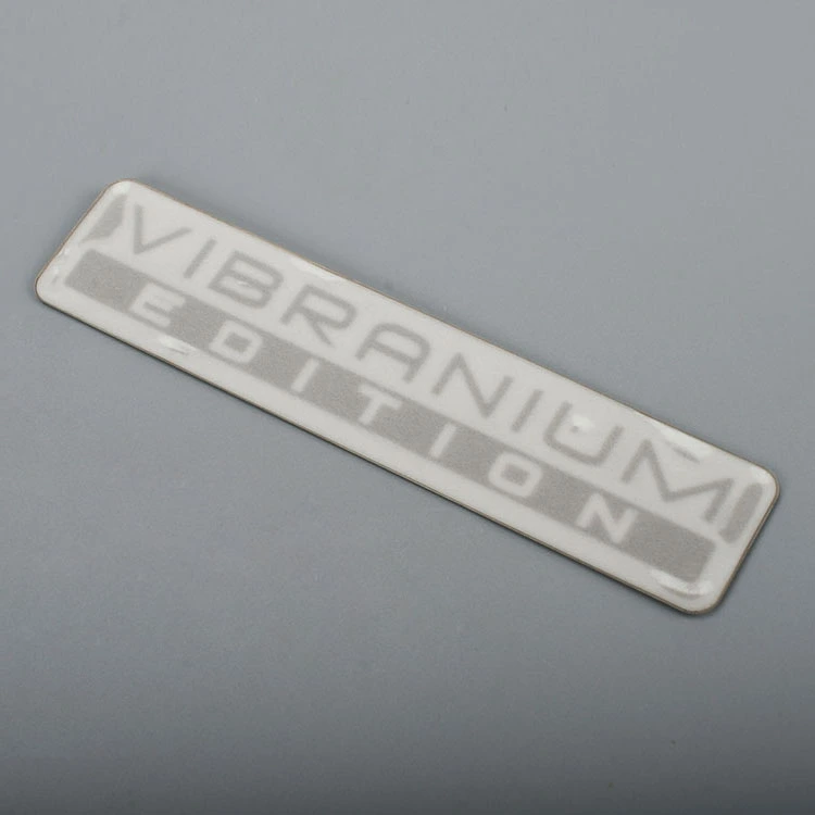 Elektroform metalletikett Nickellogotypklistermärke