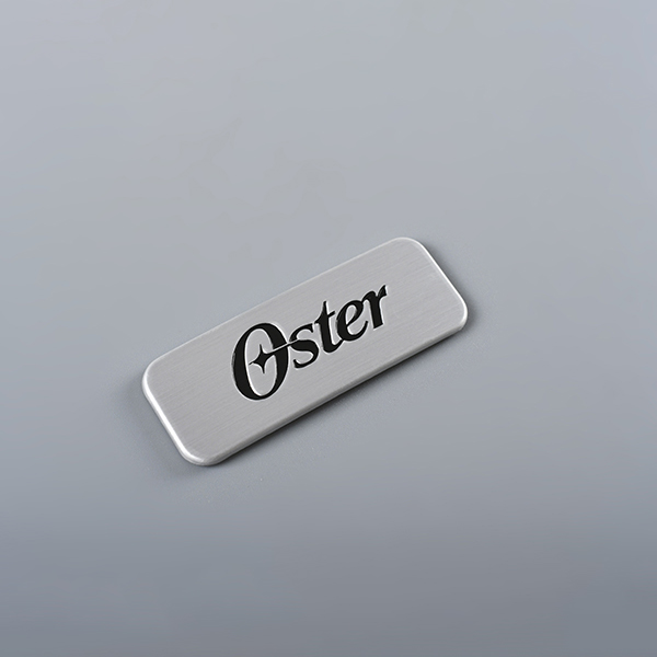 Graverad logotyp metall Taggar