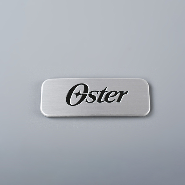 Graverad logotyp metall Taggar