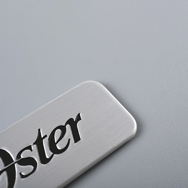 Graverad logotyp metall Taggar