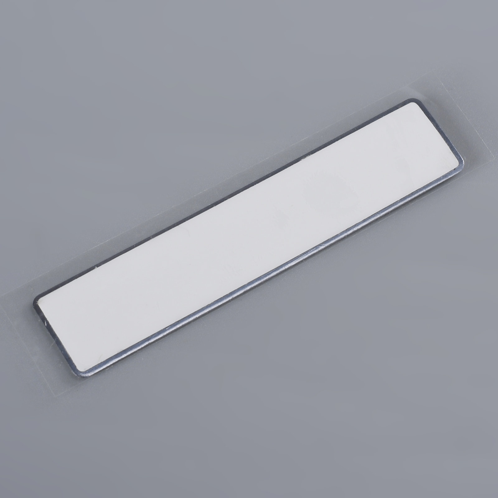 Självhäftande etsad aluminiumetikett