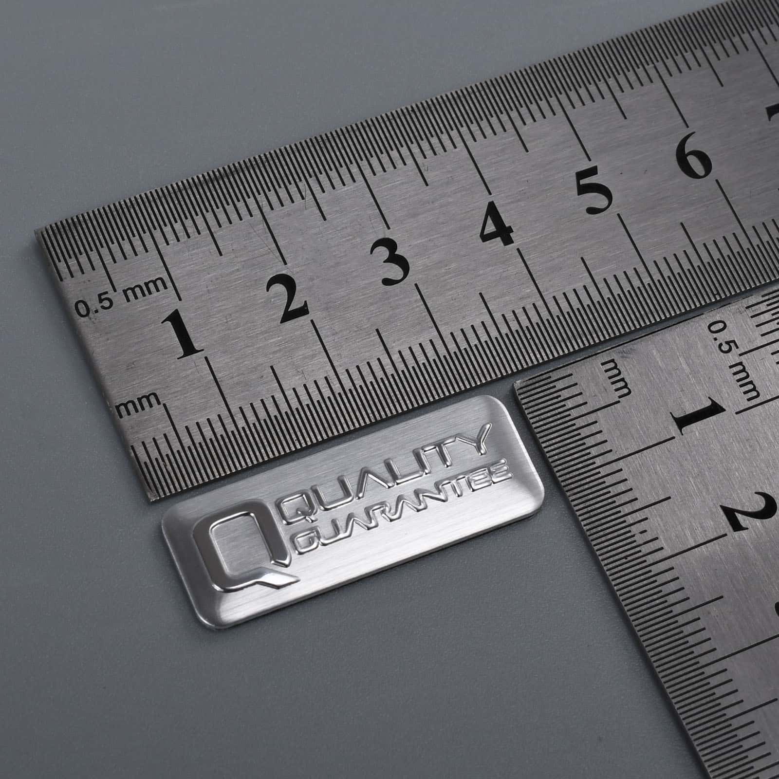 Upphöjd silverdiamantskärande logoplåt i aluminium