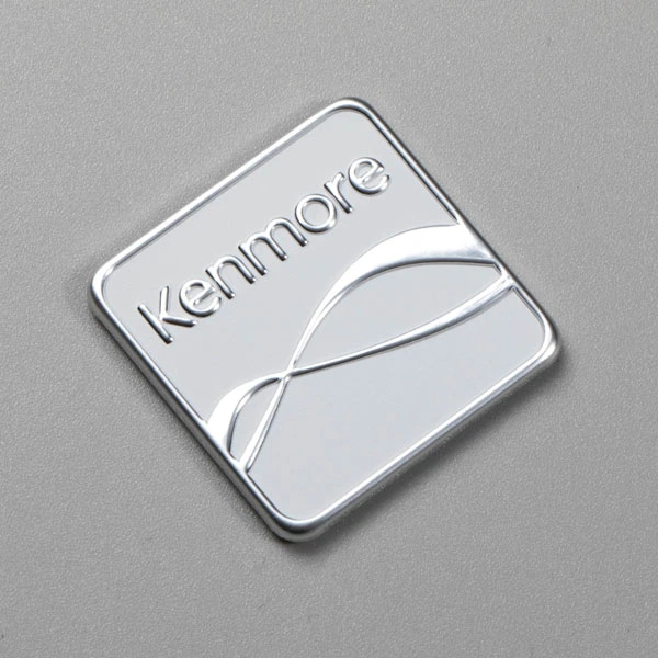 Logotyptagg i aluminium