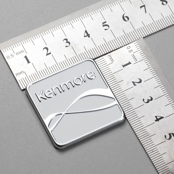 Logotyptagg i aluminium