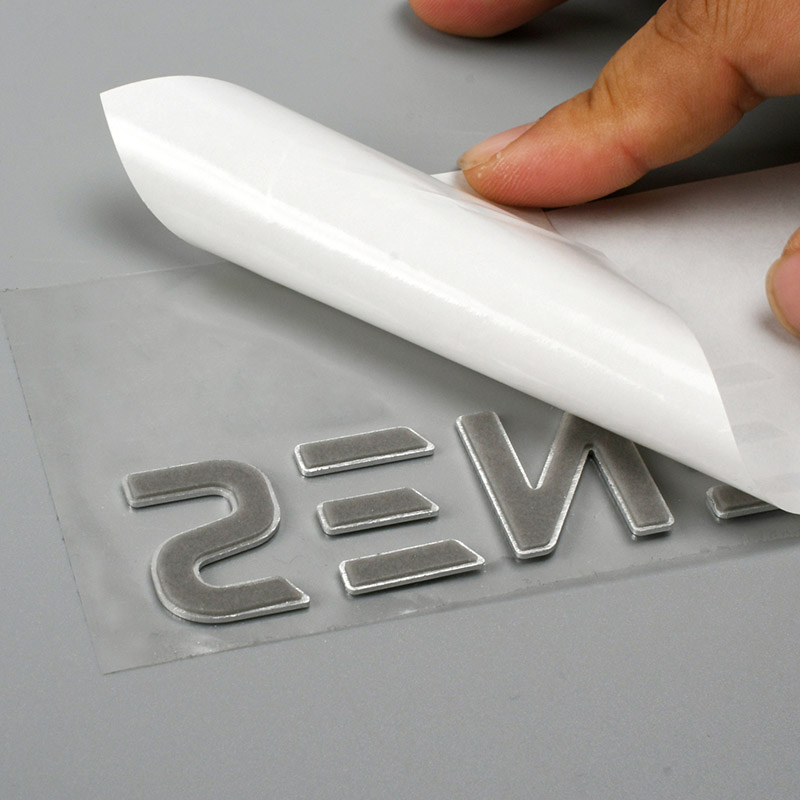 Logotyp graverad metall
