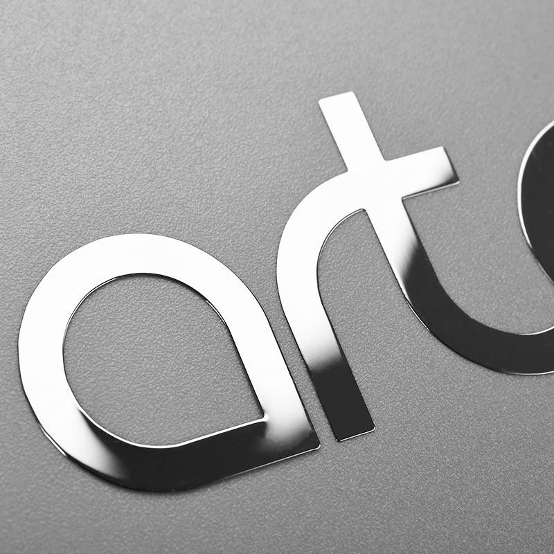 Metall klistermärke Logotyp