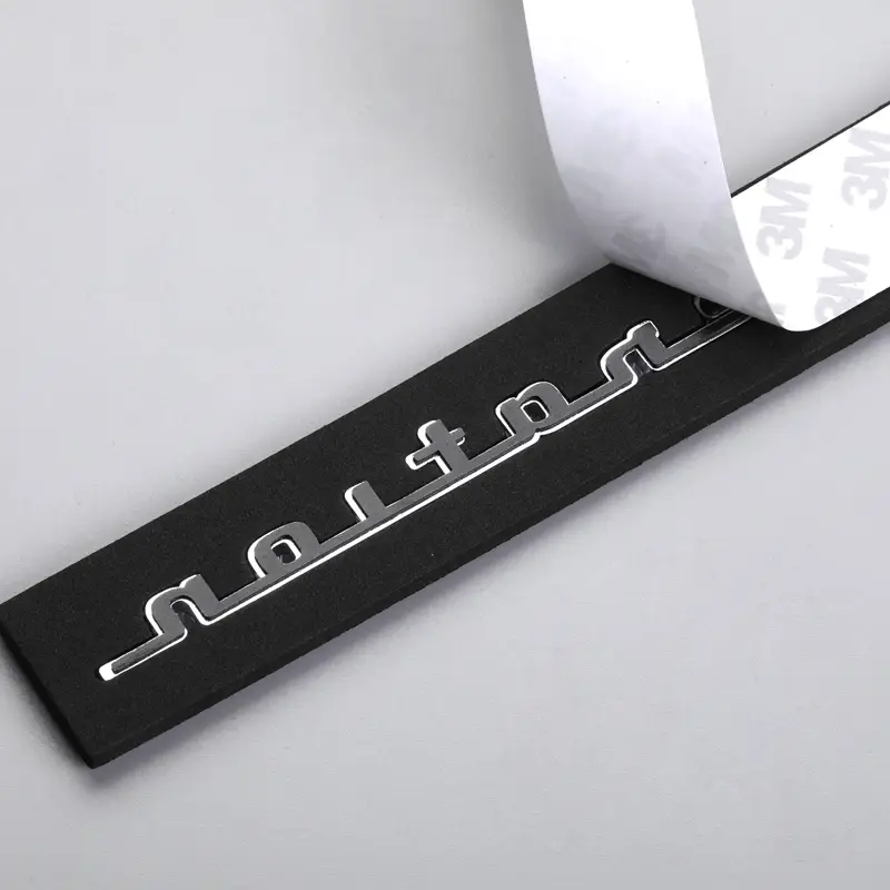 Självhäftande emblem