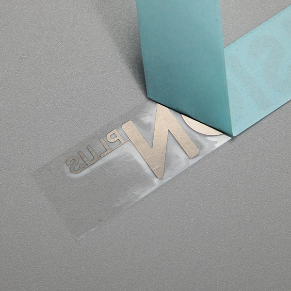 Överför metall logotyp klistermärke